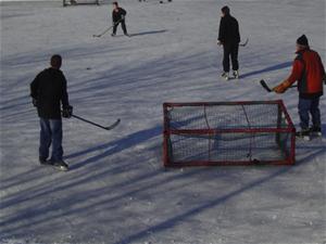 Playing ice hockey at Elm Avenue Park
