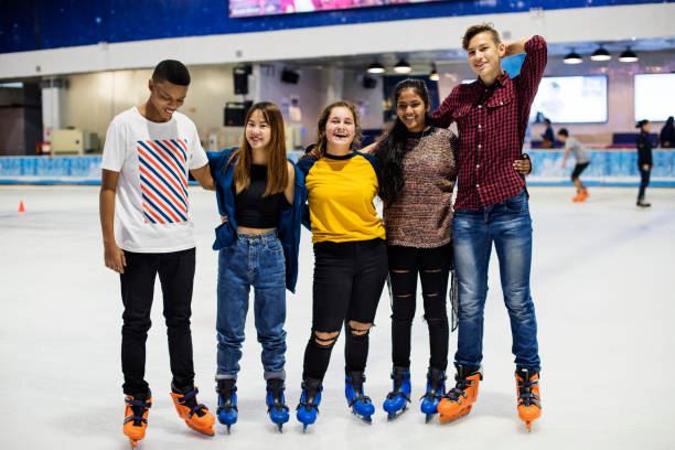 Teenagers at Indoor Ice Skating rink -istockphoto